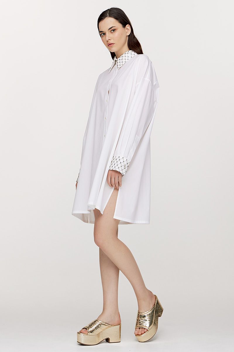 Loose poplin shirtdress with hand–beaded details