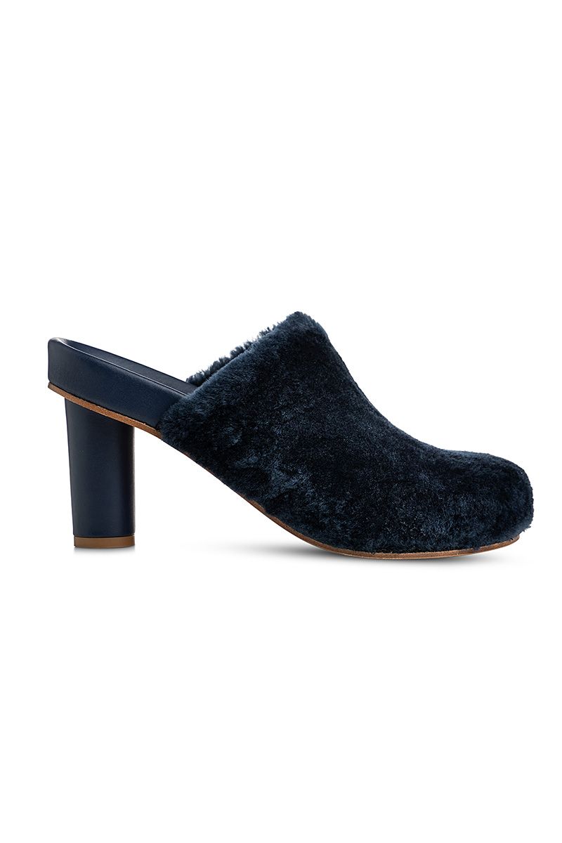 Faux shearling mules in navy blue