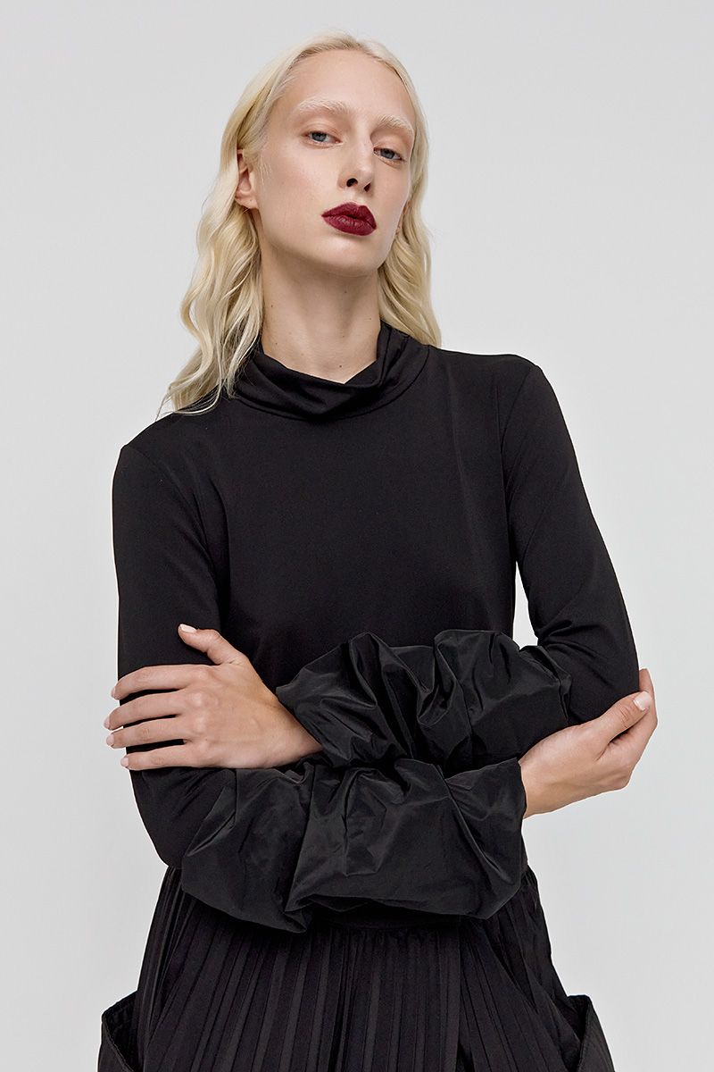 Turtleneck blouse with puffed cuffs