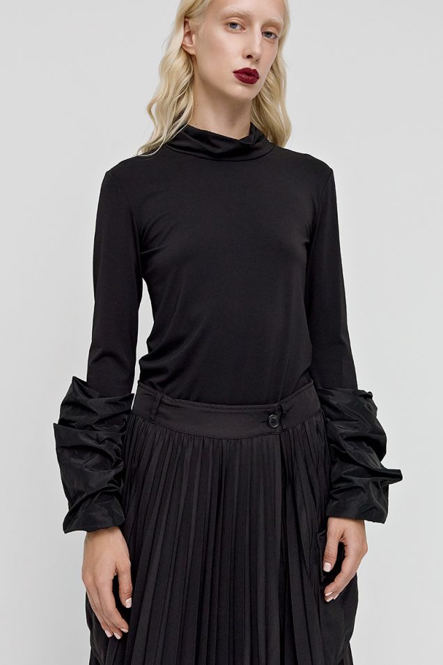 Turtleneck blouse with puffed cuffs